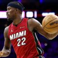 Miami Heat's Jimmy Butler dribbles the ball