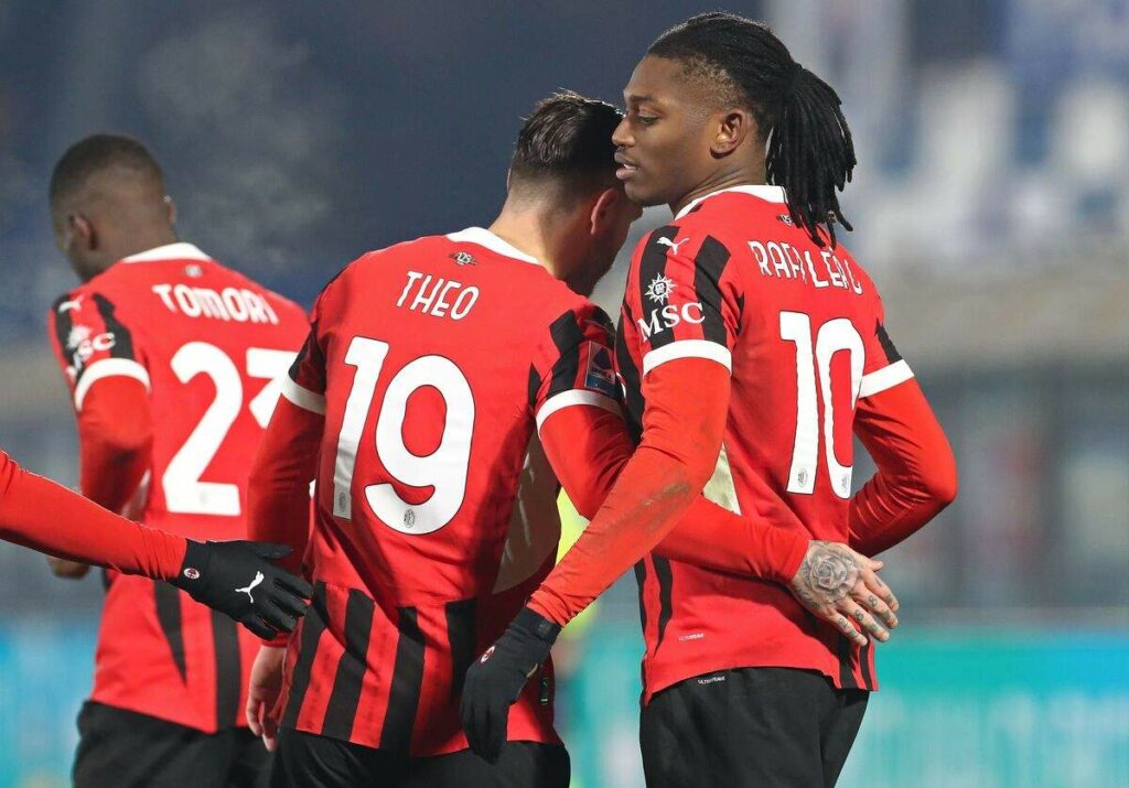 AC Milan players after scoring against Como