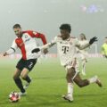 Bart Nieuwkoop and Kingsley Coman during Feyenoord's 3-0 win over Bayern Munich