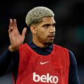 Barcelona central defender Ronald Araujo waving to fans