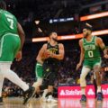 Stephen Curry attacking Boston Celtic's basket