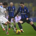 Inter and Lazio players battle for the ball in Coppa Italia semi-final