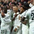 Real Madrid players celebrate after scoring a goal