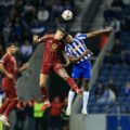 Players from Roma and Porto jump for a high ball