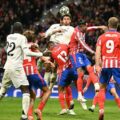 Raul Asencio outjumping Atletico Madrid defence