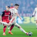 Joshua Kimmich shoots towards Bayer Leverkusen's net in a Champions League 1/8 final clash