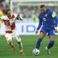 Real Madrid teammates Luka Modric and Kylian Mbappe against one another during the France - Croatia Nations League match