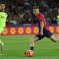 Barcelona player shoots towards Mallorca net
