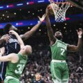 Jaylen Brown catching a rebound
