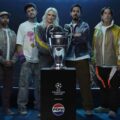 Legendary rock band Linkin Park posing with the Champions League trophy
