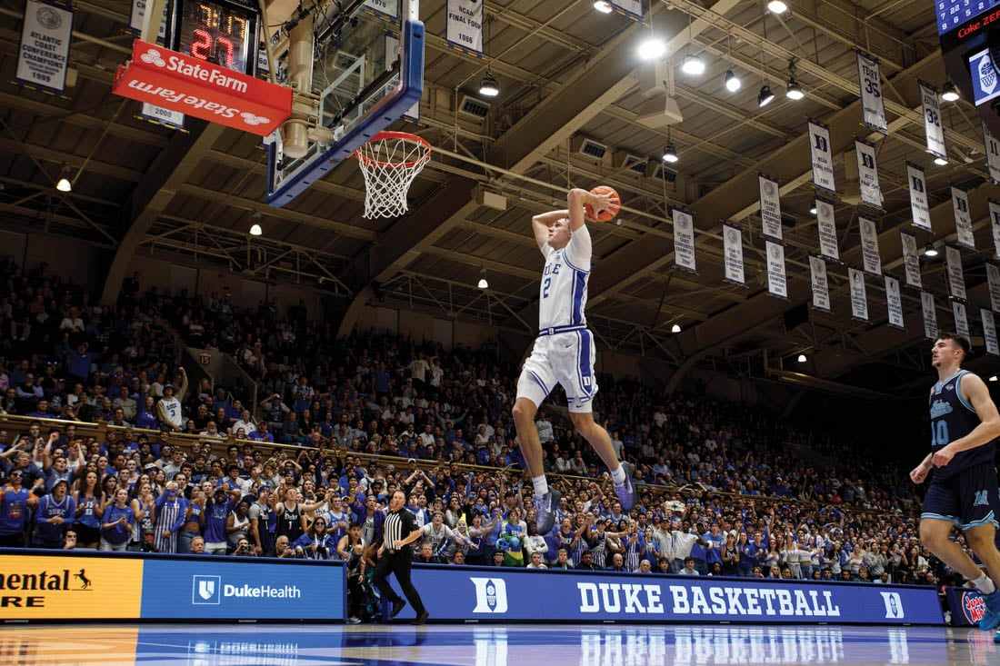 Cooper Flagg is about to dunk the ball