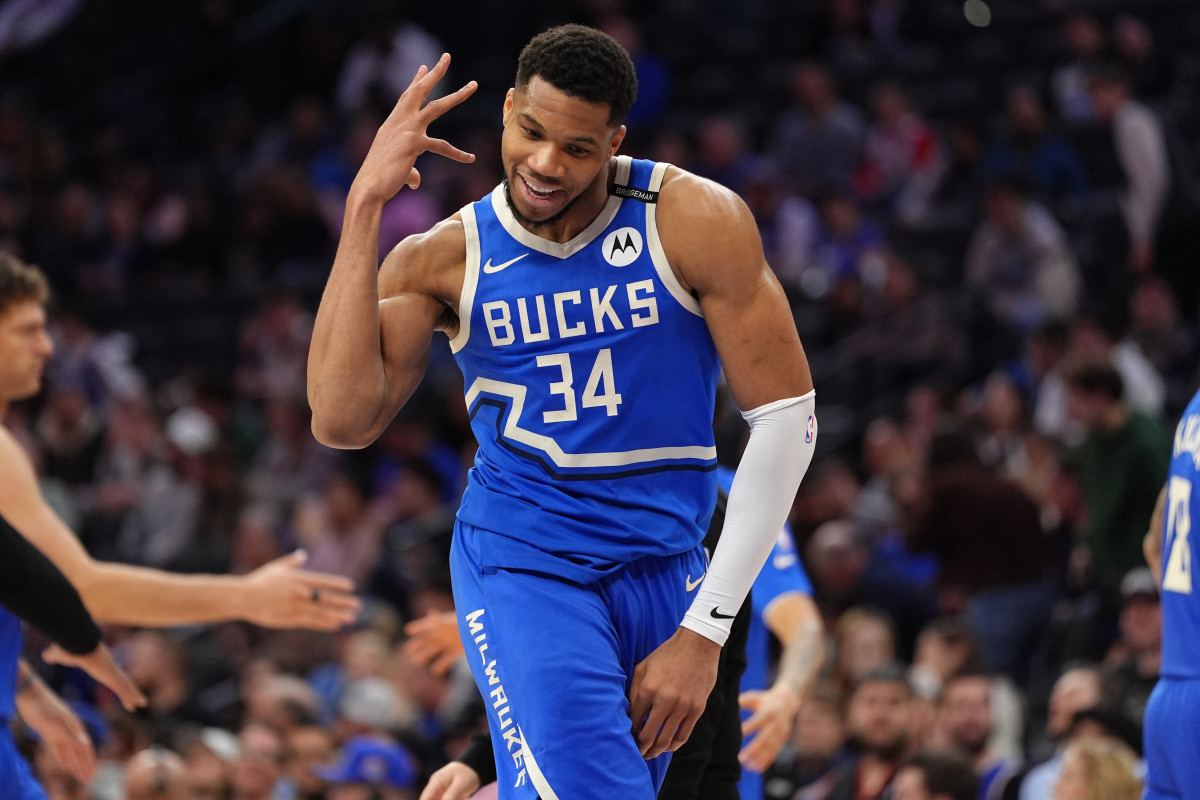 Giannis Antetokounmpo celebrates after scoring a 3-pointer
