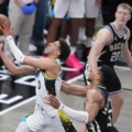 Tyrese Haliburton lays the ball up in Milwaukee basket