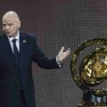 Fifa president Gianni Infantino presenting the Club World Cup trophy