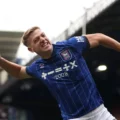 Liam Delap celebrates after scoring another goal for Ipswich