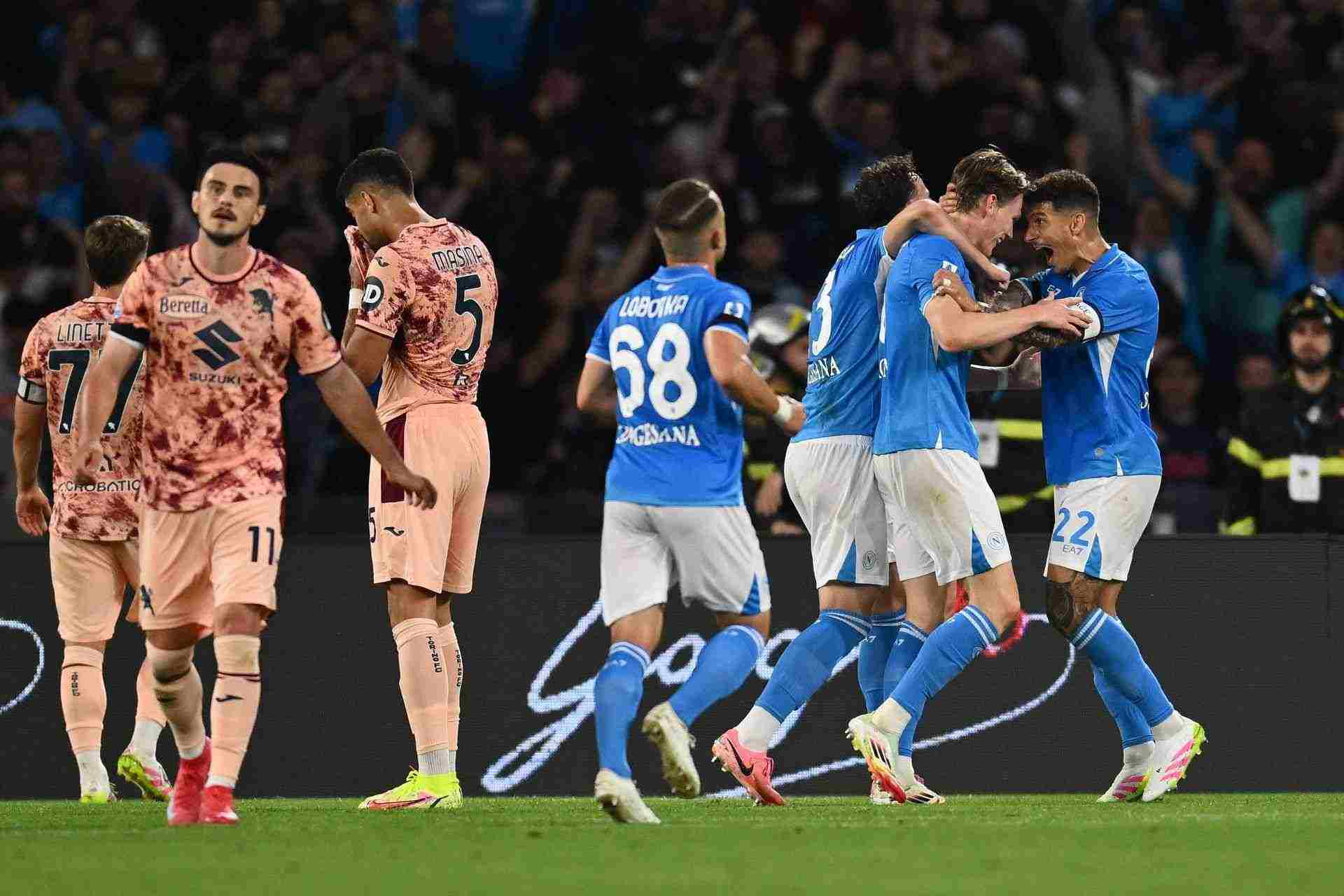 Napoli players celebrate after Scott McTominay has scored against Torino