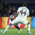 Ousmane Dembele trying to escape Kamara's tackle