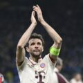 Thomas Muller applauds the fans after his last match in the Champions League for Bayern Munich