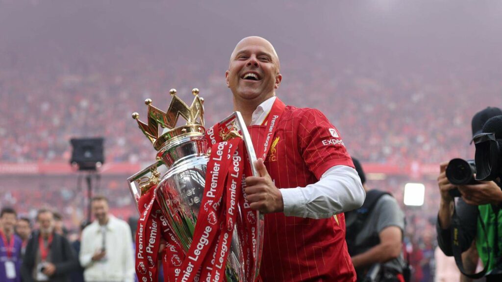 Arne Slot lifting the Premier League title