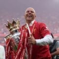 Arne Slot lifting the Premier League title