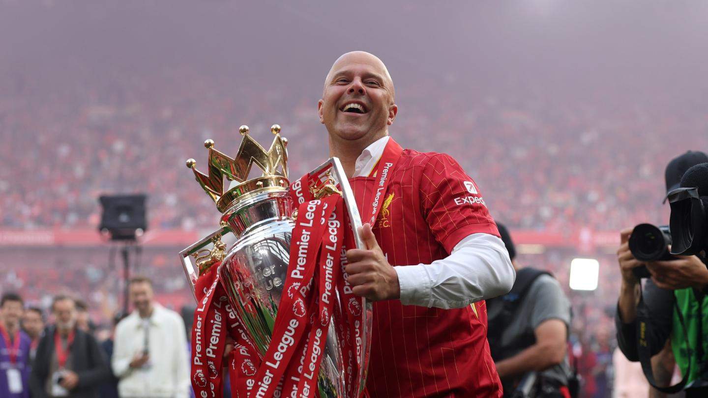 Arne Slot lifting the Premier League title