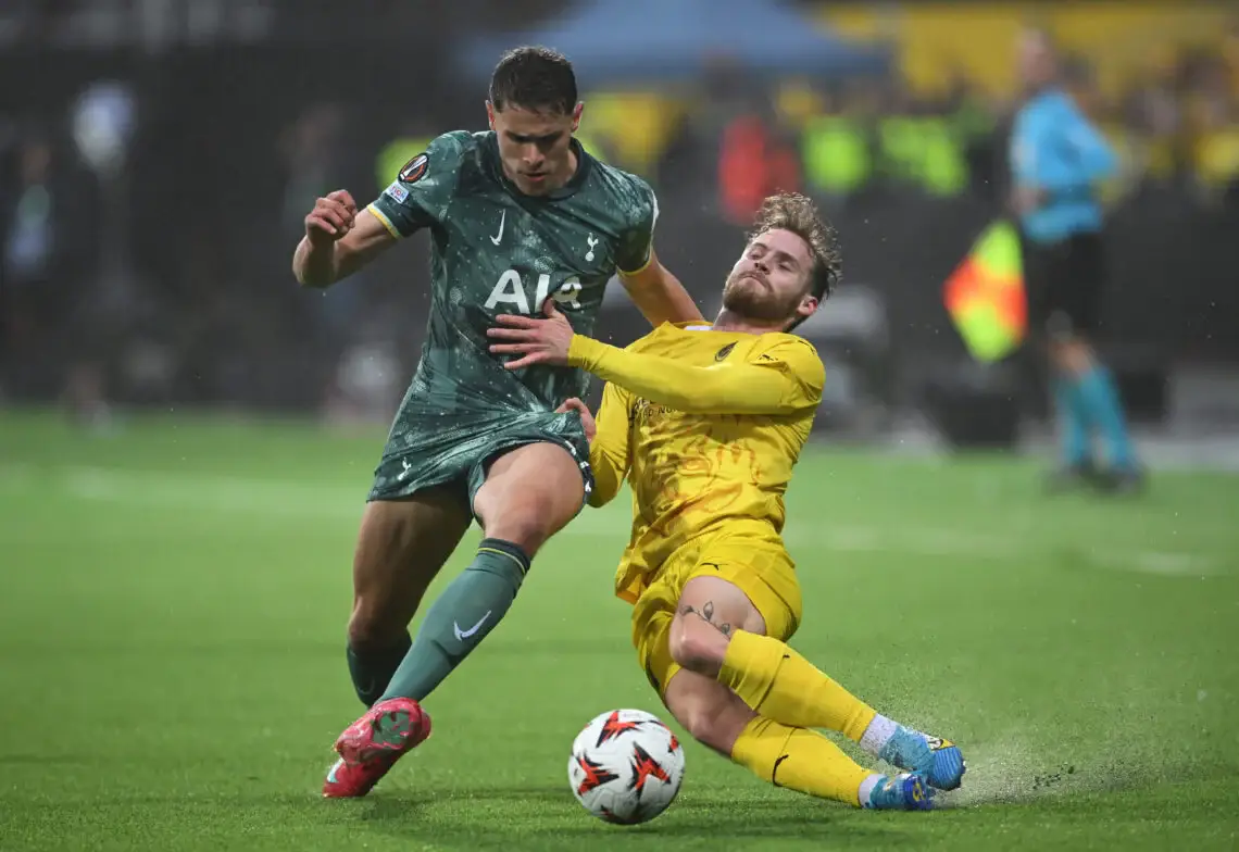 Bodo/Glimt player trying to stop Pedro Porro