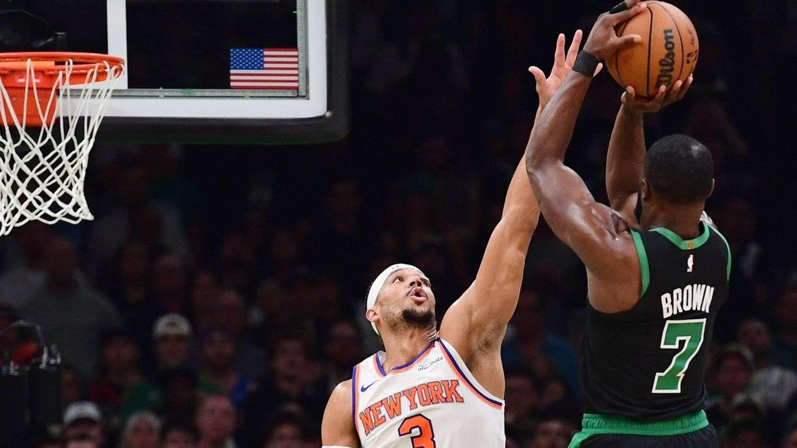 Jaylen Brown shoots over Josh Hart