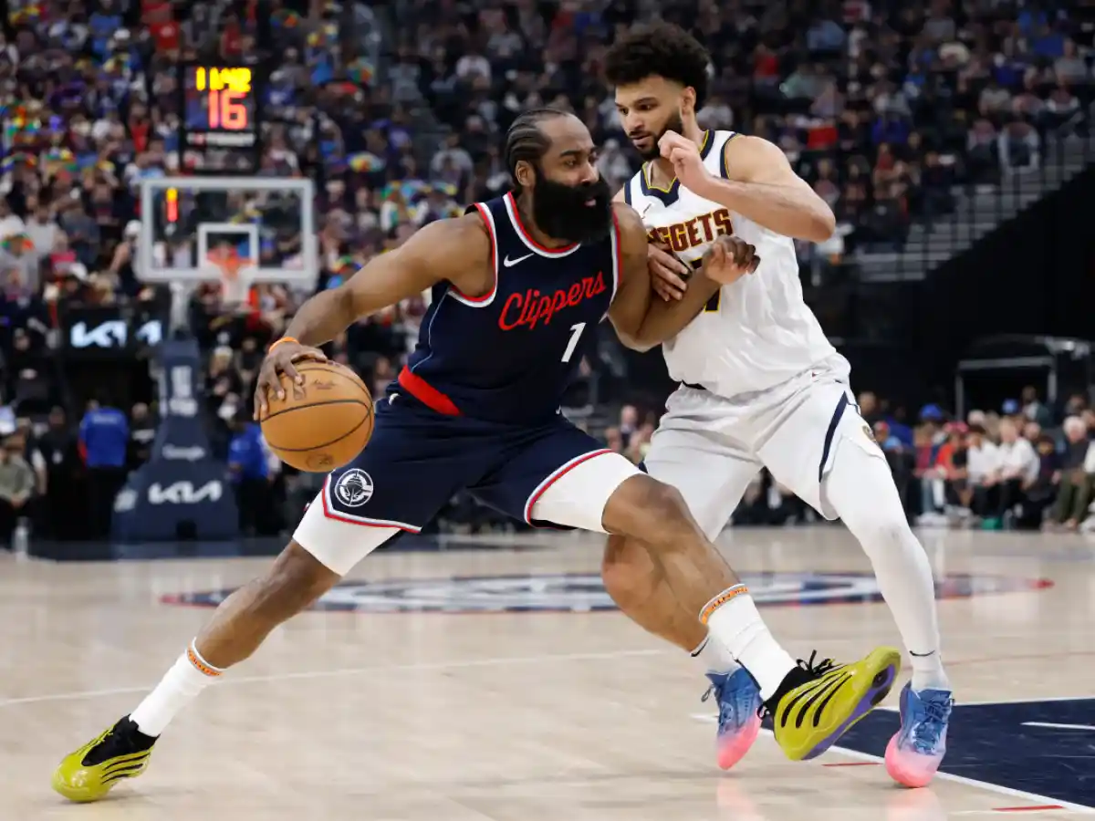 James Harden guarded by Jamal Murray