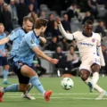Chelsea striker Nico Jackson shoots towards Djurgarden's net