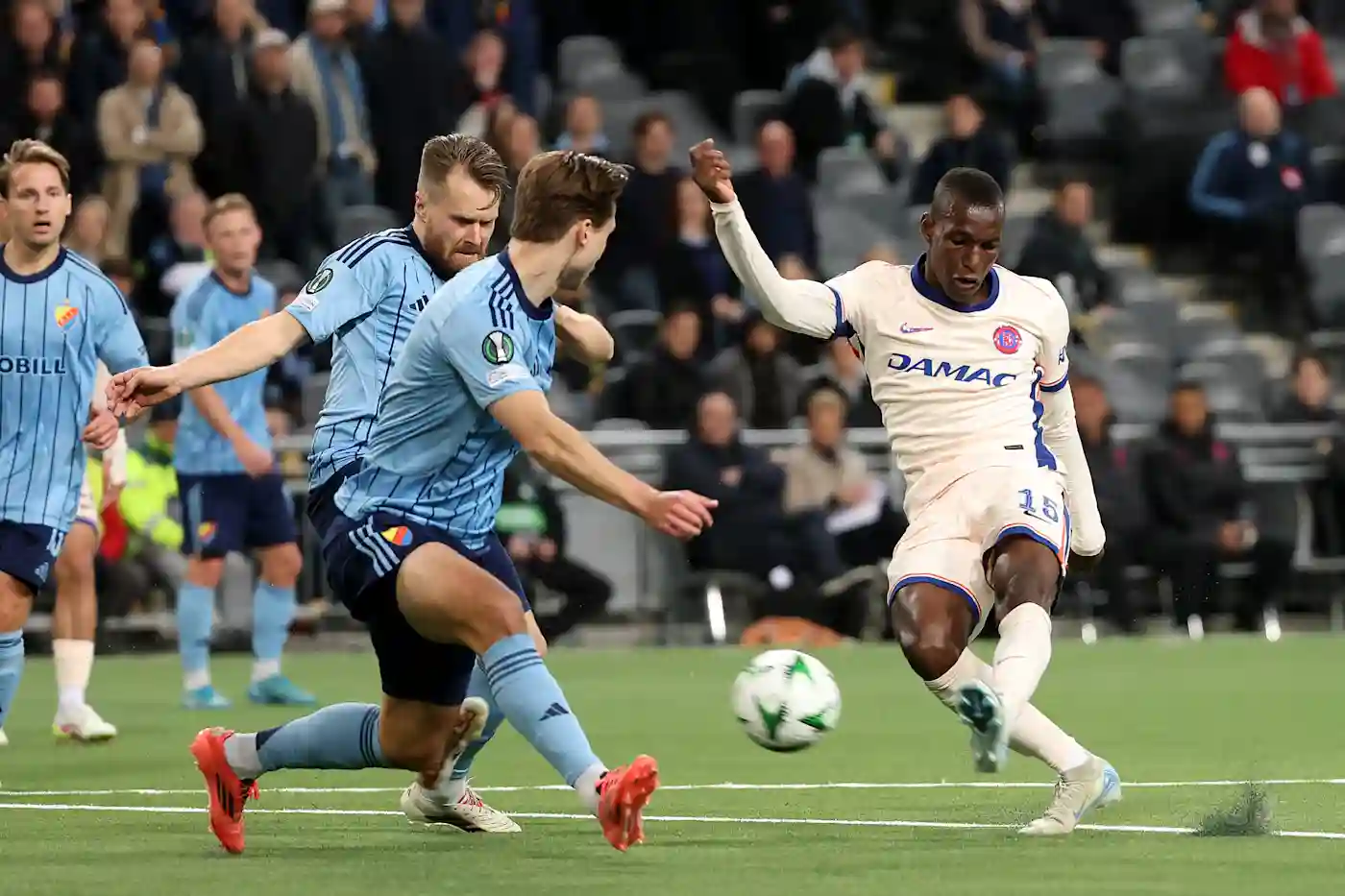 Chelsea striker Nico Jackson shoots towards Djurgarden's net