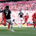 Bukayo Saka shoots towards Liverpool's goal