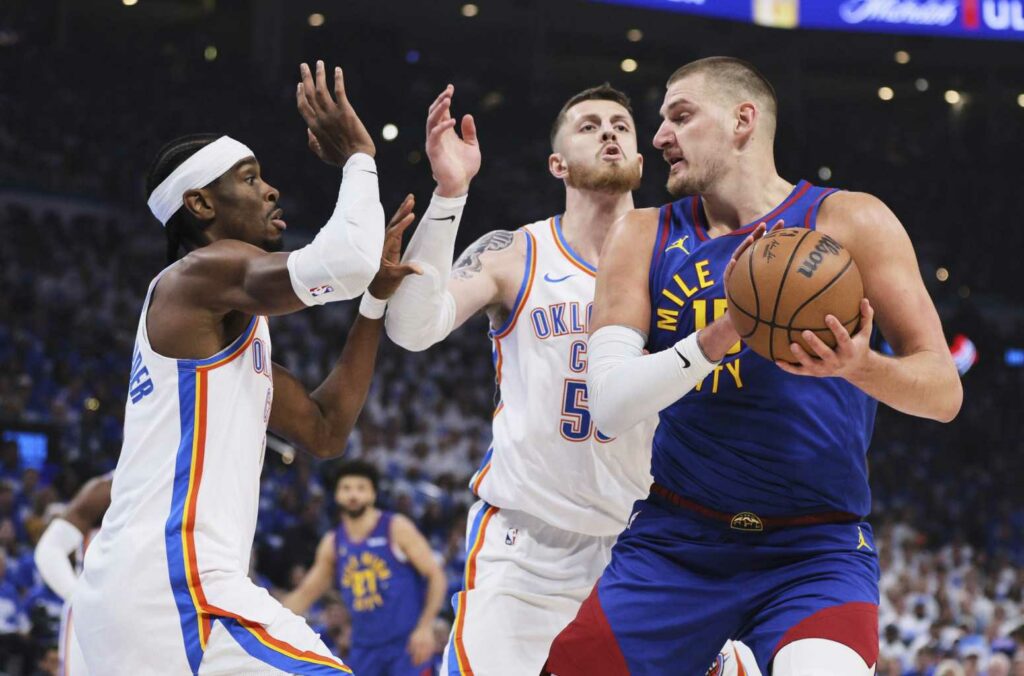 Nikola Jokic double-teamed by Shai Gilgeous-Alexander and Isaiah Hartenstein