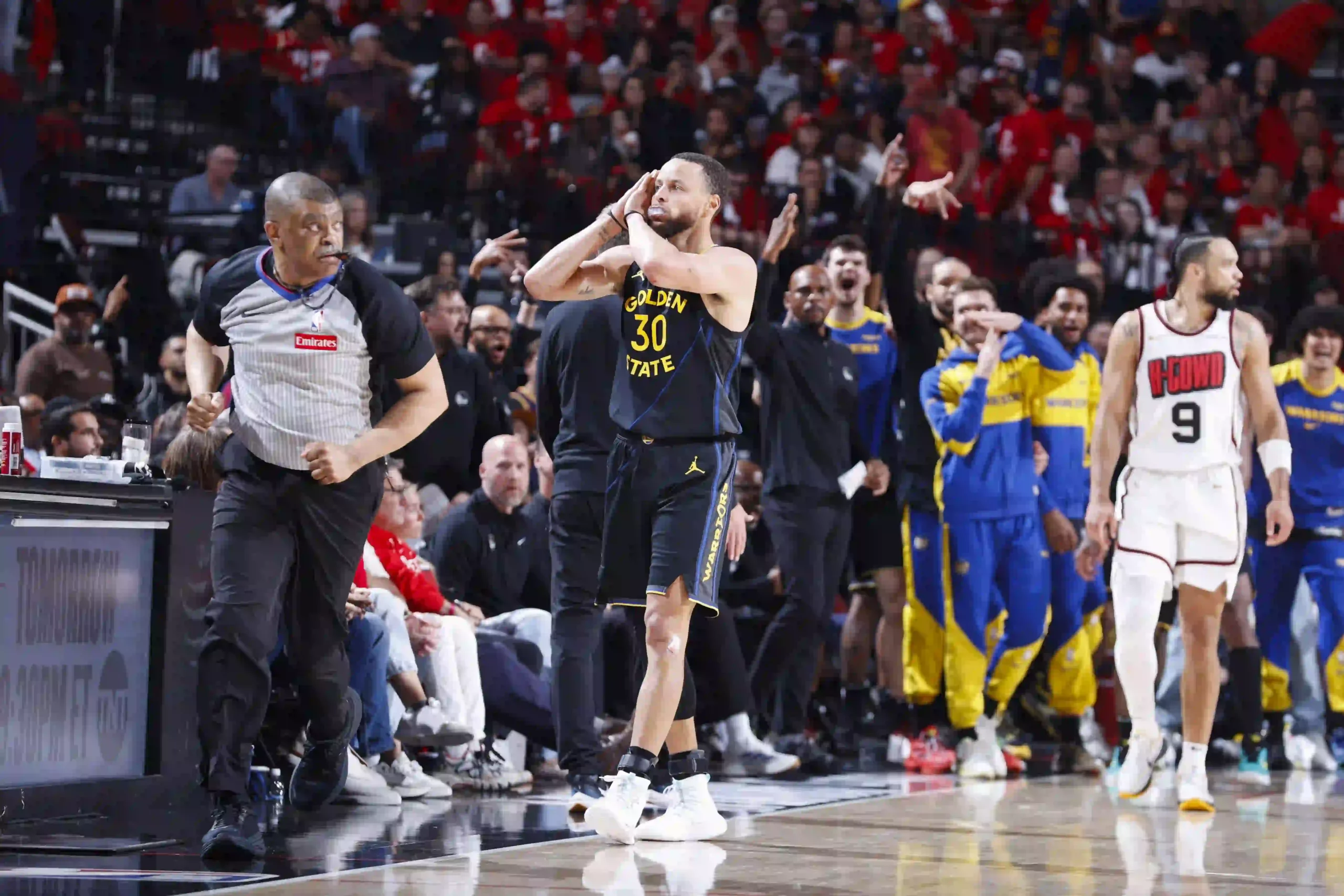 Steph Curry with his typical 'night-night' celebration against the Houston Rockets