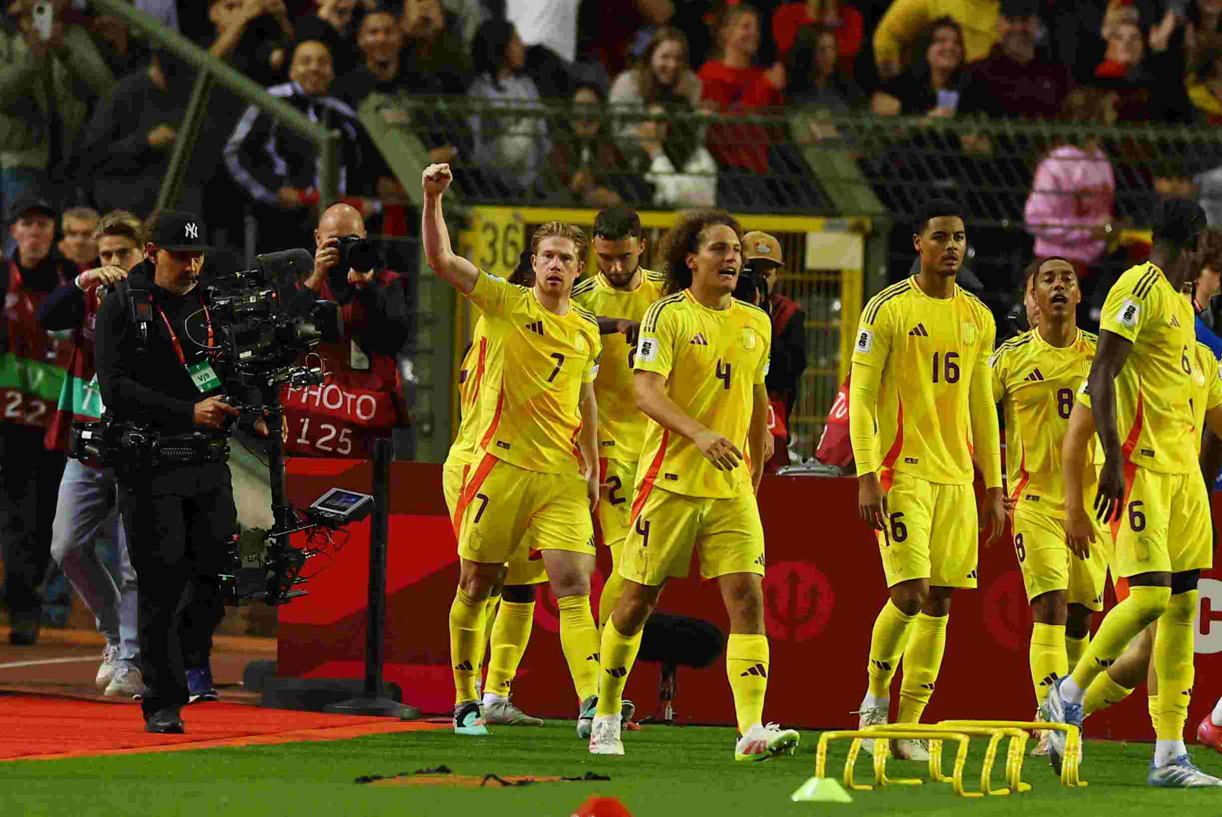 Belgium players celebrate after going 4-3 up against Wales