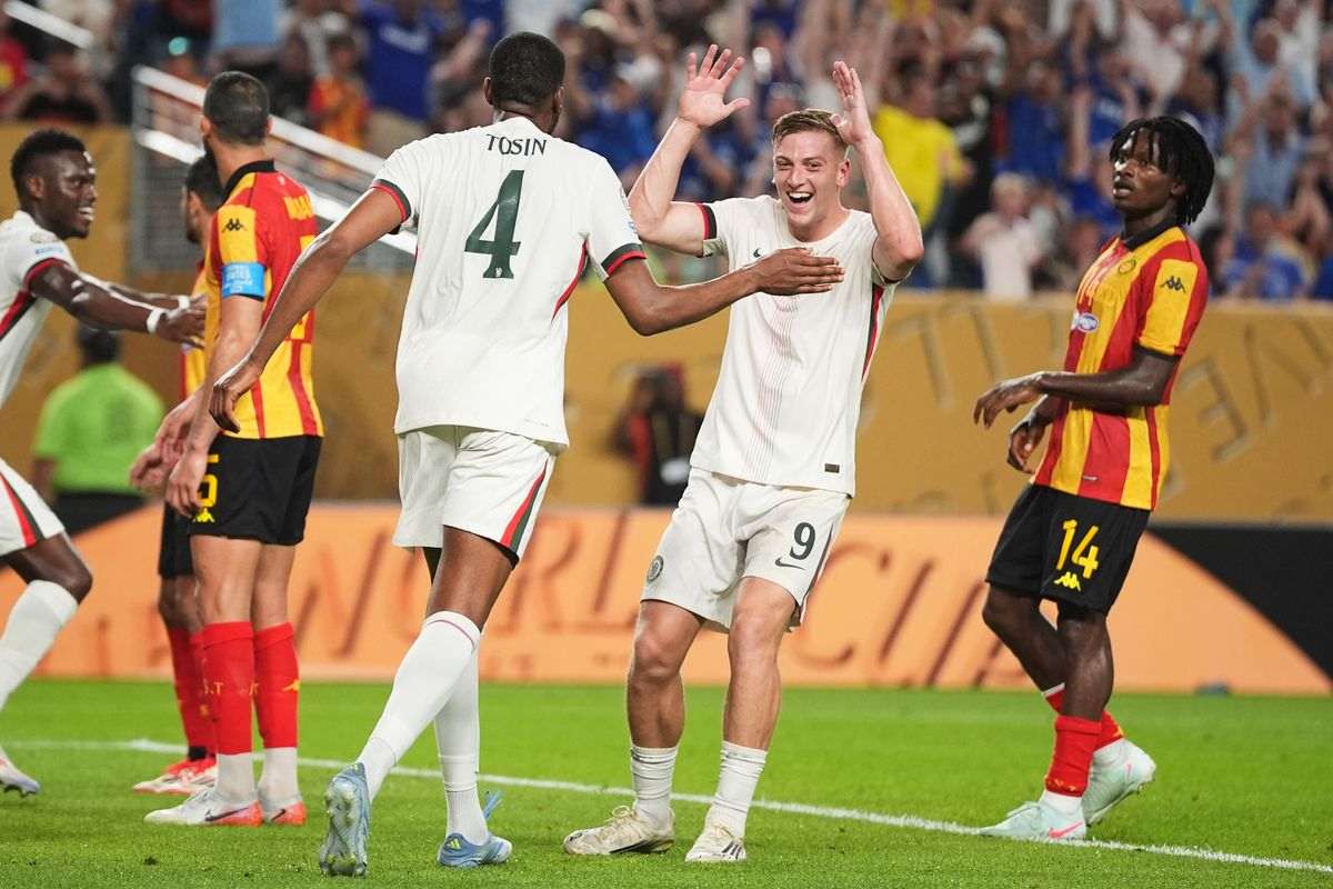 Liam Delap and Tosin celebrate after Chelsea score against Esperance
