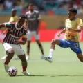 Mamelodi Sundowns player trying to stop Fluminense's captain