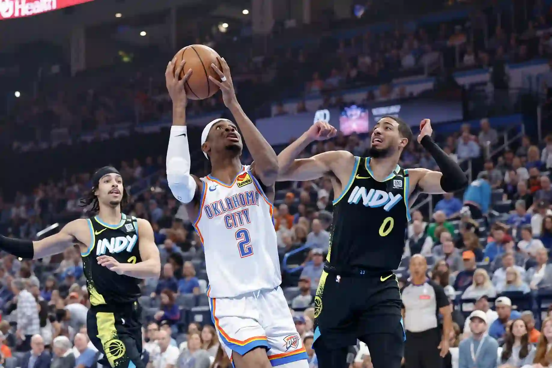 Tyrese Haliburton trying to prevent Shai Gilgeous-Alexander from scoring