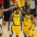 Indiana Pacers players congratulate each other during Game 6 of the NBA Finals against OKC Thunder