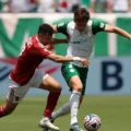 Palmeiras and Al Ahly players battle for the ball