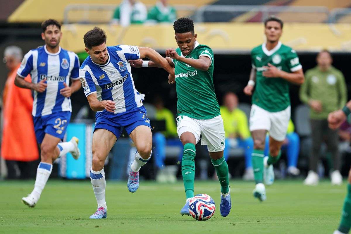 Estevao Willian with the ball trying to evade Porto player