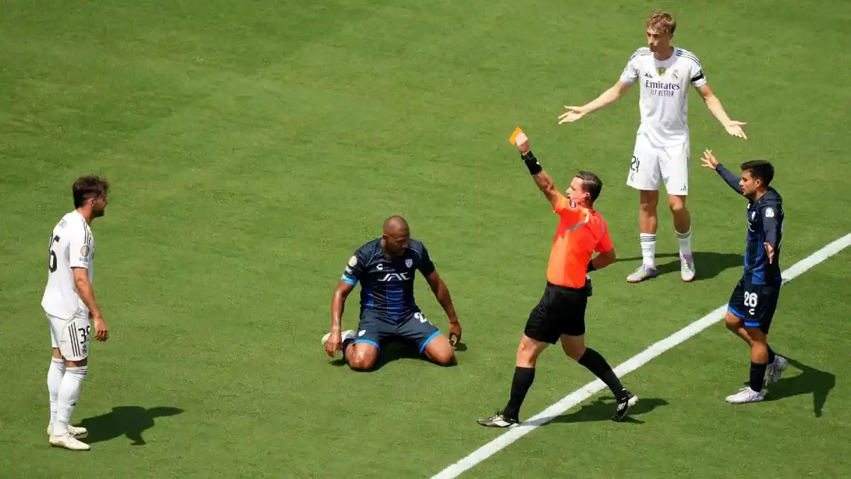 Raul Asencio being shown straight red card in Real Madrid's match against Pachuca