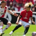 Franco Mastantuono trying to take the ball from Urawa Red Diamonds player