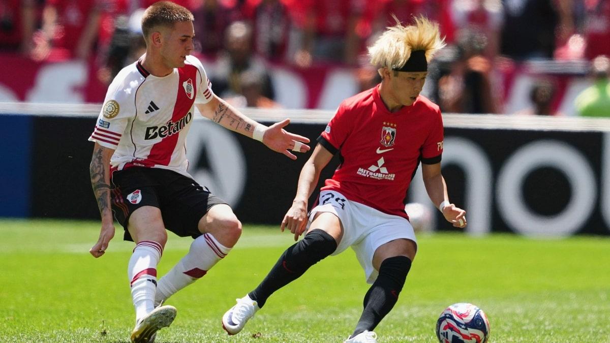 Franco Mastantuono trying to take the ball from Urawa Red Diamonds player