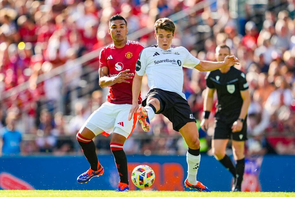 Norwegian talent Sverre Nypan protecting the ball from Casemiro