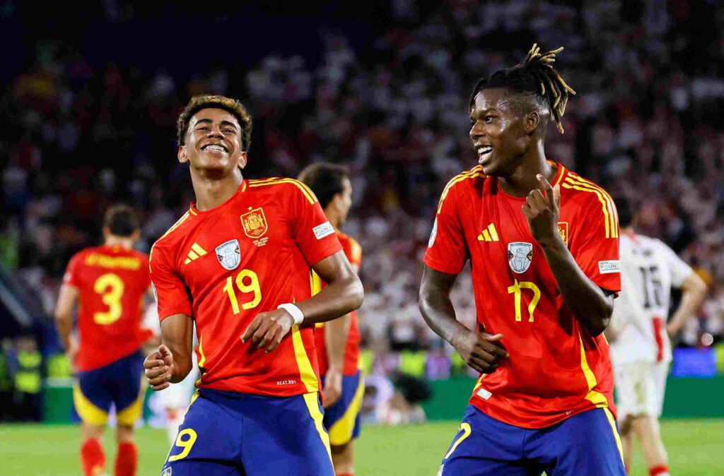 Lamine Yamal and Nico Williams celebrate after scoring for Spain
