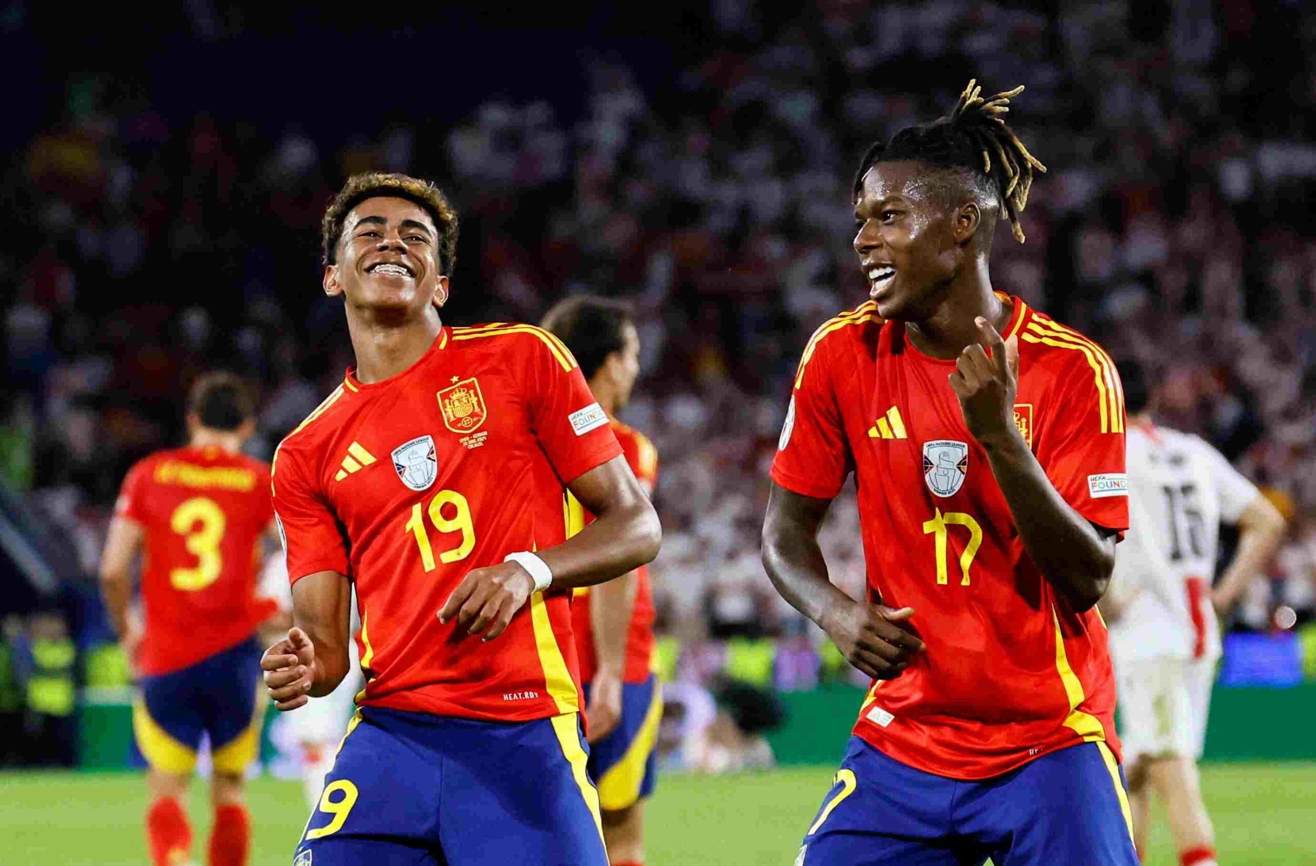 Lamine Yamal and Nico Williams celebrate after scoring for Spain