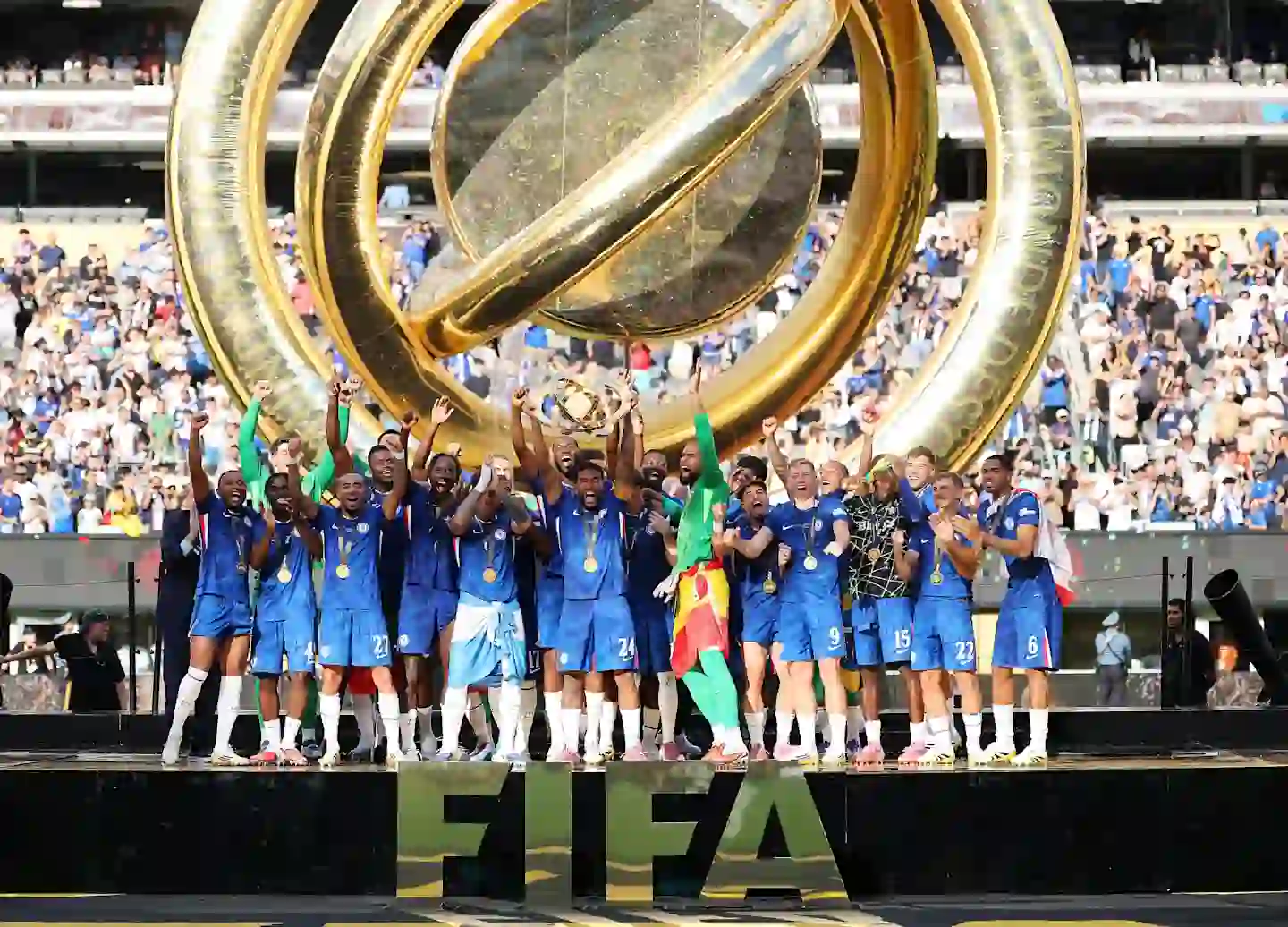 Chelsea players lift the Club World Cup trophy