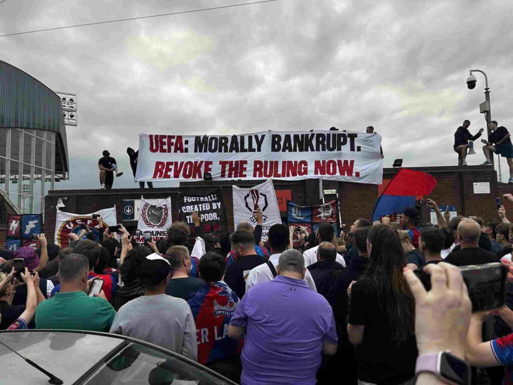 Fans of Crystal Palace protest against UEFA