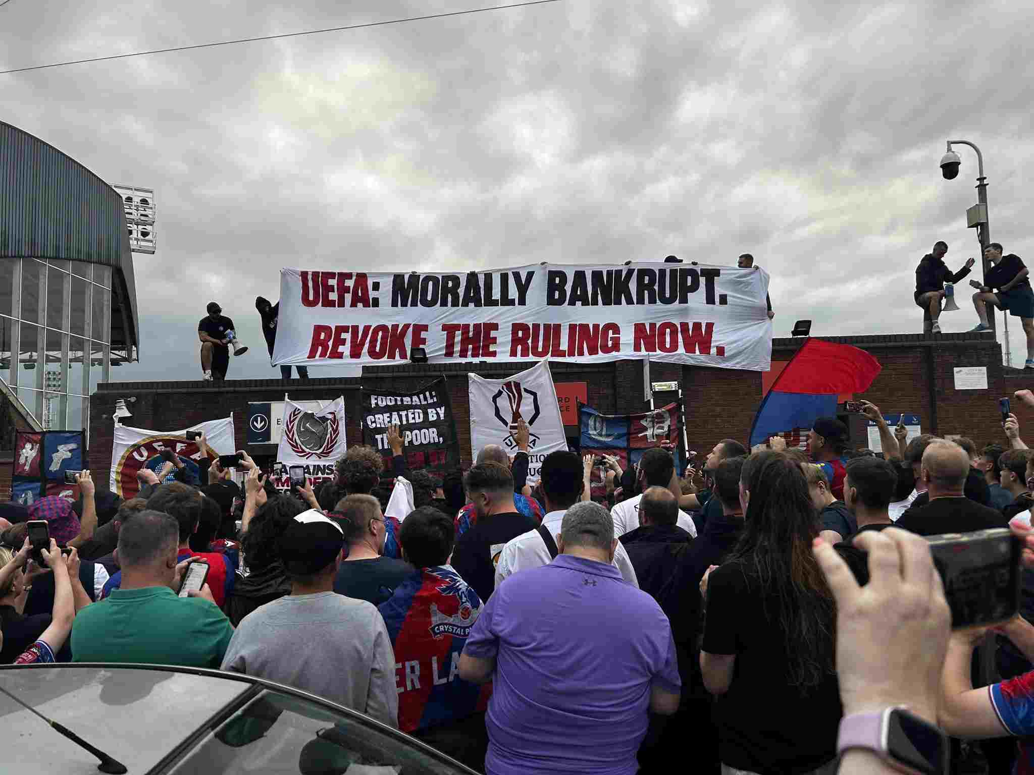 Fans of Crystal Palace protest against UEFA