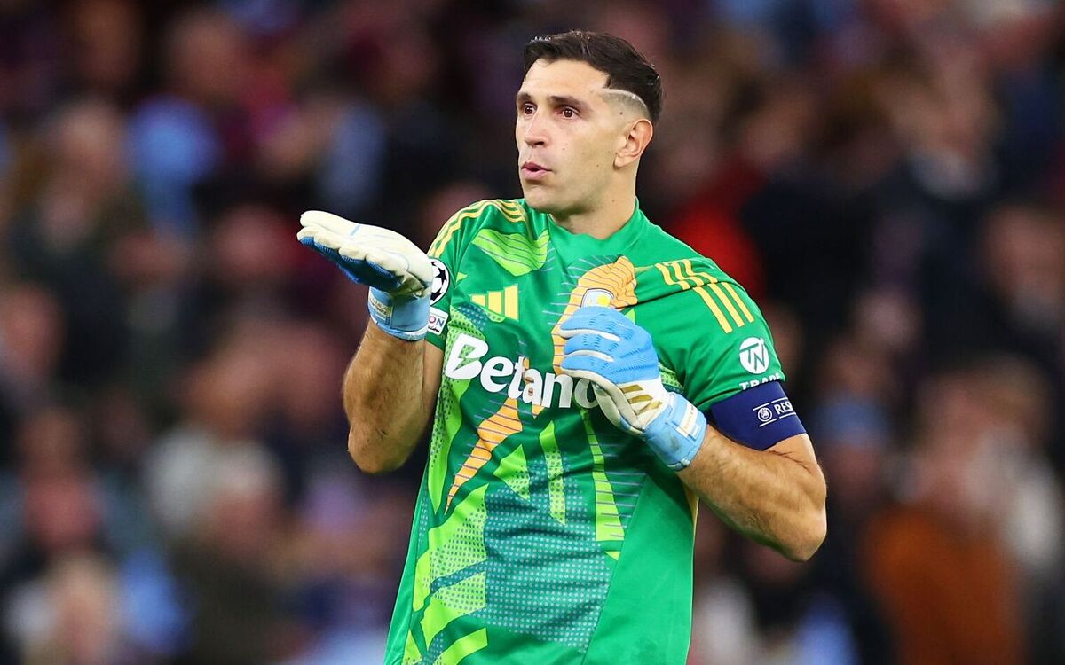 Aston Villa goalkeeper Emiliano Martinez sends an air kiss